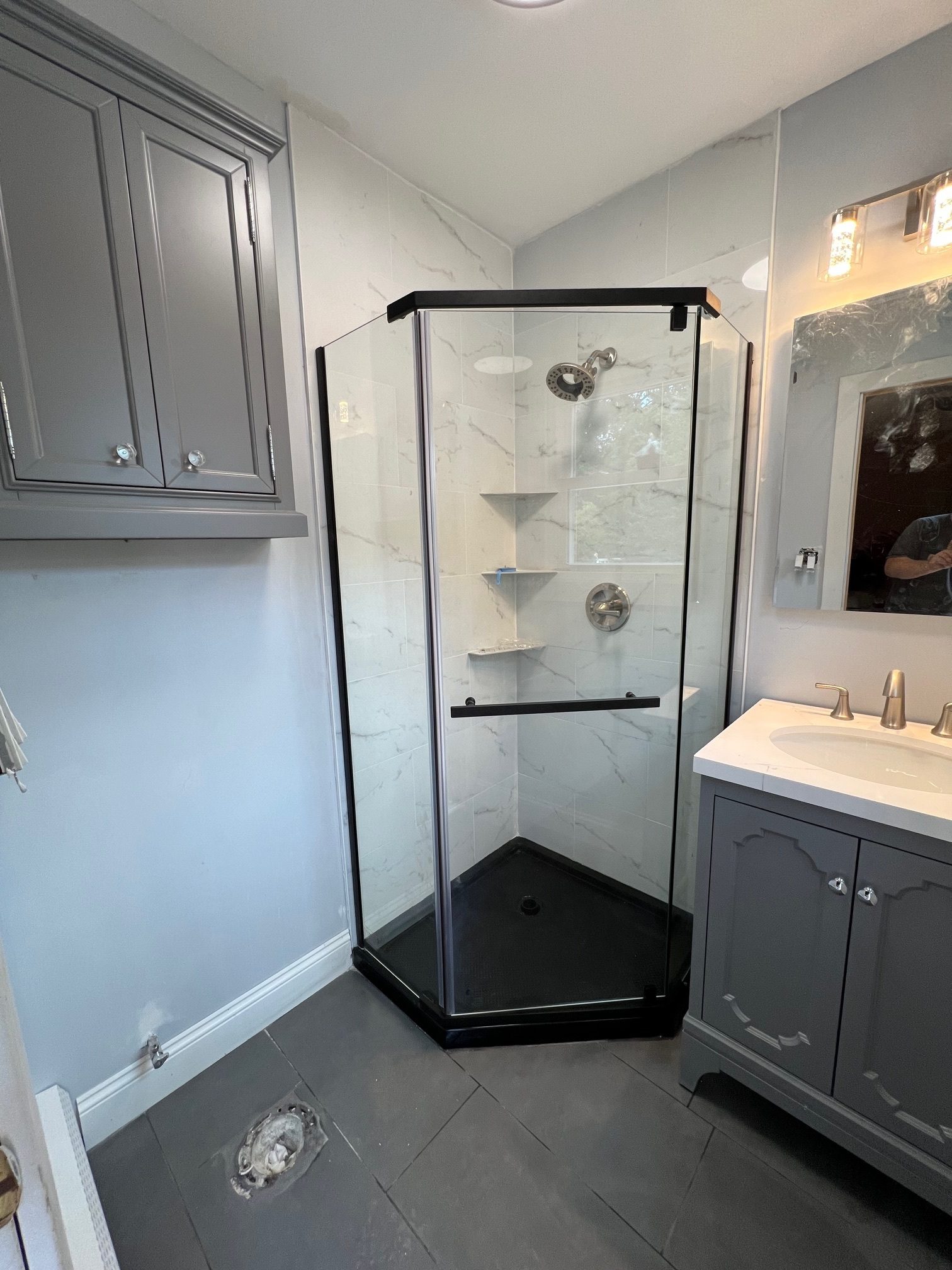 Framed corner shower installed by TGF Remodeling